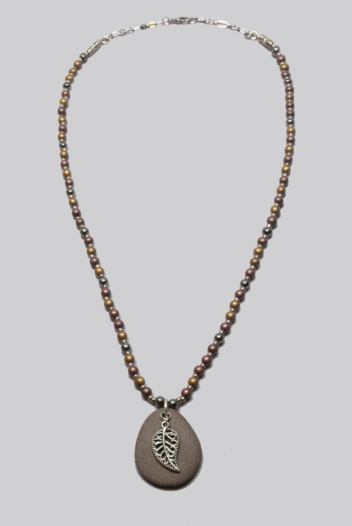 Brownish Gray River Rock with Silver Leaf Charm